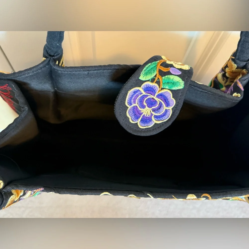 Tote with embroidered purple flowers